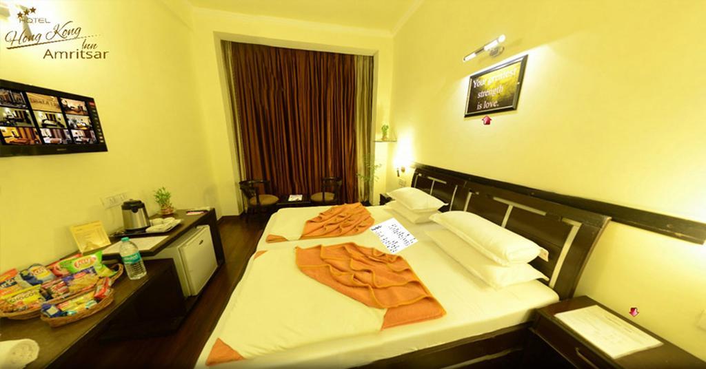 Hotel Hong Kong Inn Amritsar Oda fotoğraf