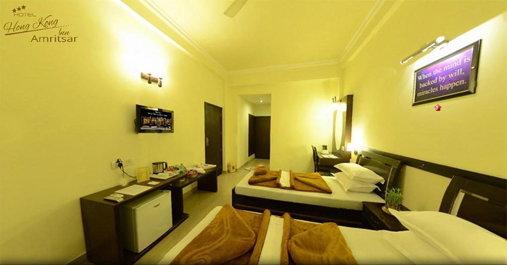 Hotel Hong Kong Inn Amritsar Oda fotoğraf