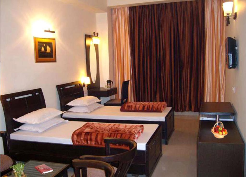 Hotel Hong Kong Inn Amritsar Oda fotoğraf
